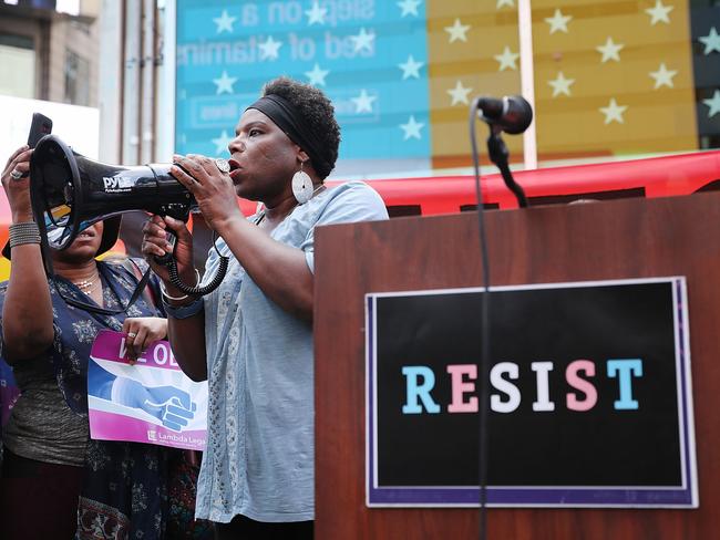 Transgender army veteran Tanya Walker speaks to protesters in Times Square near a military recruitment centre as they show their anger at President Trump’s decision to reinstate a ban on transgender individuals from serving in the military. Picture: Spencer Platt/Getty Images/AFP