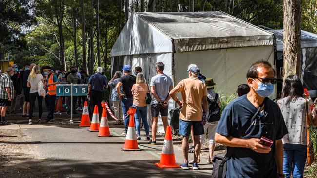 People queue to receive their vaccination at Homebush Olympic Park. Picture: Flavio Brancaleone/NCA NewsWire