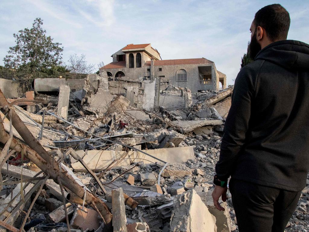 A man checks a destroyed building on January 8, 2024 after an Israeli air raid in the village of Kfar Kila in southern Lebanon, amid ongoing cross-border tensions as fighting continues between Israel and Hamas militants in Gaza. Picture: Hassan FNEICH / AFP