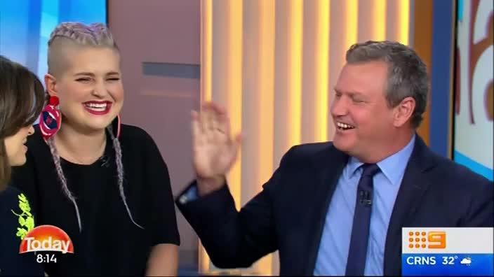 Tim Gilbert kisses Kelly Osbourne on The TODAY Show