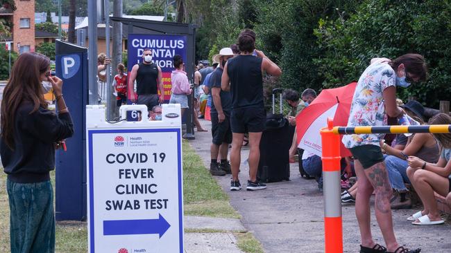 A queue of people waiting to be tested for Covid-19 at the Lismore Base Hospital testing clinic.