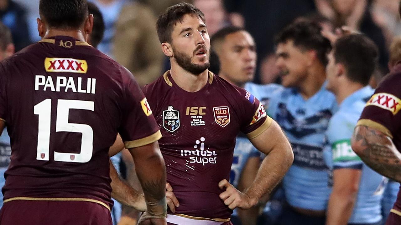 Ben Hunt of the Maroons looks on after a Blues try.
