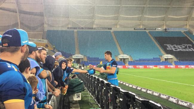 Fans photos from the Titans and Rabbitohs NRL game.