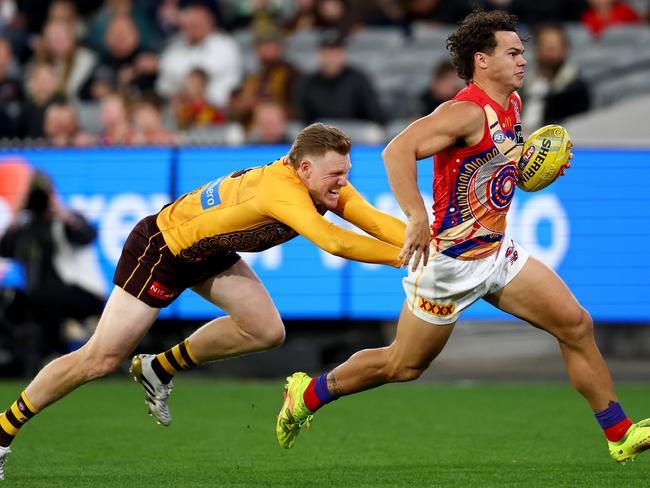 Cam Rayner breaks away from James Sicily. Picture: Josh Chadwick/AFL Photos
