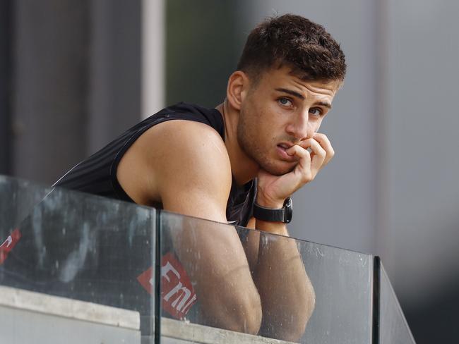 NCA. MELBOURNE, AUSTRALIA. 12th March, 2025 .  AFL.  Collingwood training at Olympic Park . Nick Daicos of the Magpies watches on during a 20 min match simulation during todays session at Olympic Park.  Picture: Michael Klein