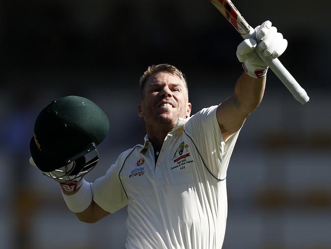 BRISBANE, AUSTRALIA - NOVEMBER 22: David Warner of Australia celebrates after reaching his century during day two of the 1st Domain Test between Australia and Pakistan at The Gabba on November 22, 2019 in Brisbane, Australia. (Photo by Ryan Pierse/Getty Images)