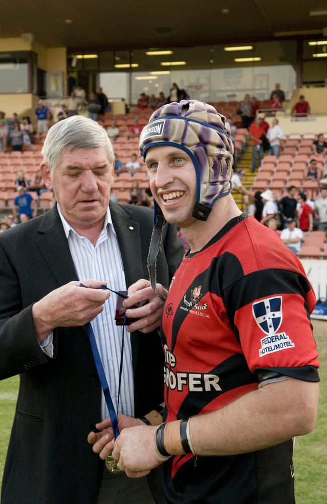 John McDonald presents Gus McKellar with his man of the match award, Valleys Roosters v Oakey Bears, TRL grand final at Clive Berghofer Stadium, 2011. Photo Kevin Farmer / The Chronicle