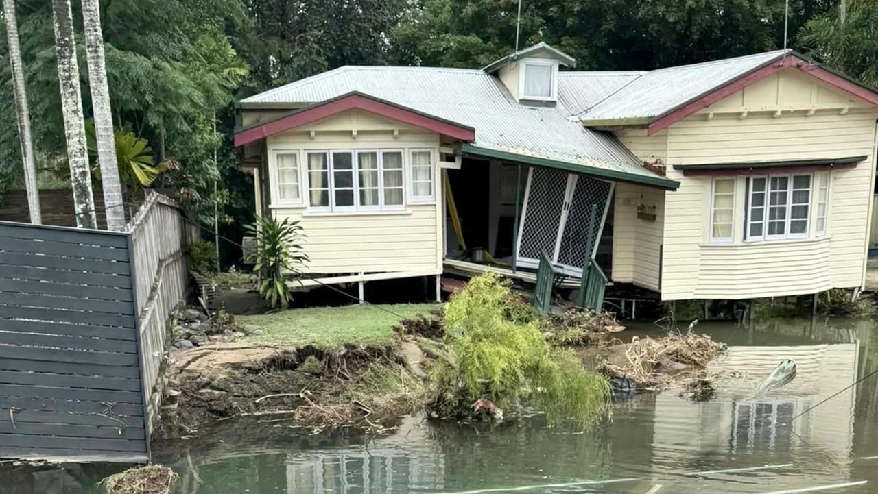 This Holloways Beach house collapsed under the weight of the floods. Photo Facebook Kevin Sven Kainzinger