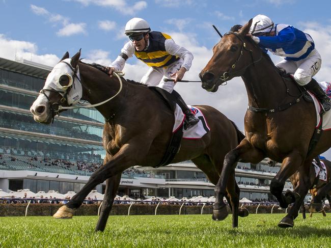 MELBOURNE, AUSTRALIA - SEPTEMBER 10: Mark Zahra riding I'm Thunderstruck defeats Tim Clark riding Alligator Blood in Race 5, the Pfd Food Services Makybe Diva Stakes, during Melbourne Racing at Flemington Racecourse on September 10, 2022 in Melbourne, Australia. (Photo by Vince Caligiuri/Getty Images)