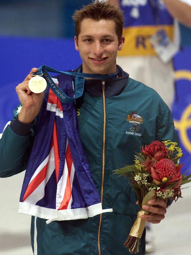 Ian Thorpe holds his 400m freestyle gold medal at the Sydney Games in 2000.