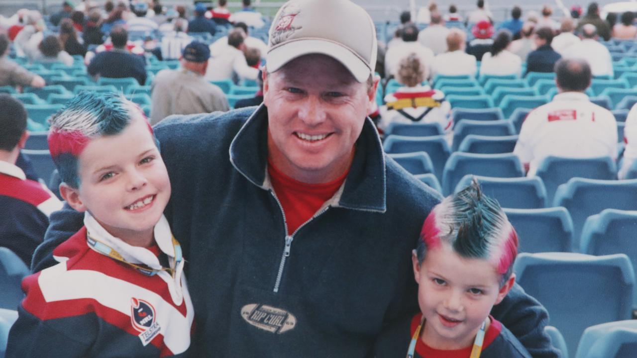 A young Jayden and Blayke with Dad Glenn.