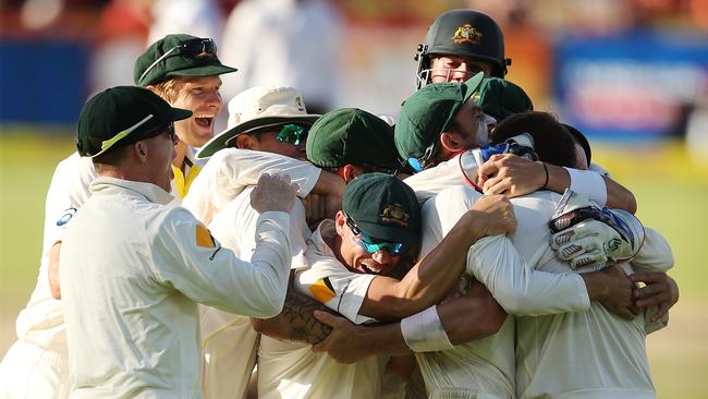 Australian celebrate at the close of day five after South Africa made them work for the win.