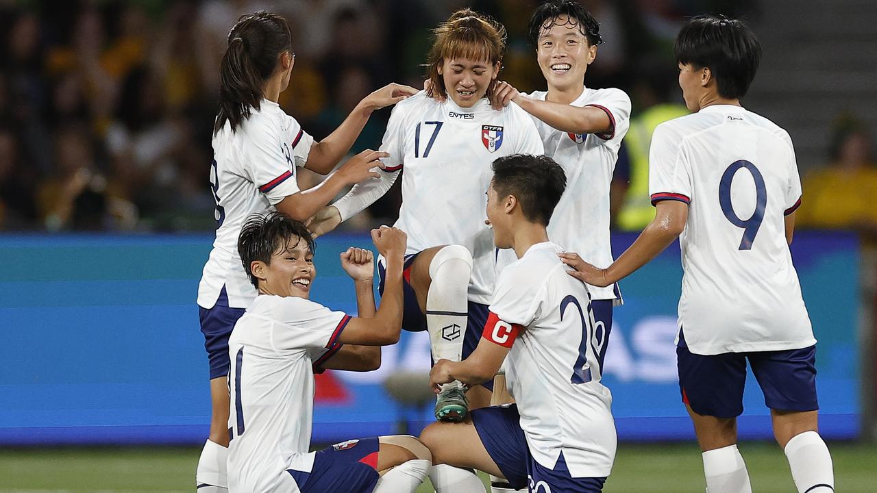 Taiwanese striker Chen Jin-wen (no. 17) celebrates with teammates after scoring a goal during Chinese Taipei’s 3-1 loss to the Matildas at AAMI Park on Wednesday night. Picture: Daniel Pockett / Getty Images