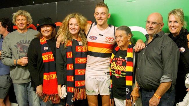 Hugh Greenwood with his family after a Crows game. Picture: Twitter/Adelaide Football Club