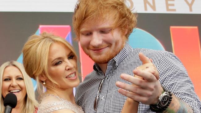 SYDNEY, AUSTRALIA - NOVEMBER 26: Kylie Minogue and Ed Sheeran dance on the red carpet ahead of the 29th Annual ARIA Awards 2015 at The Star on November 26, 2015 in Sydney, Australia. (Photo by Mark Metcalfe/Getty Images)