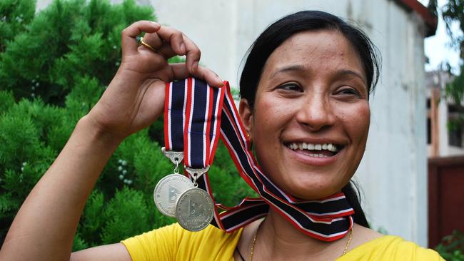 Indian mountaineer and mother of two children Anshu Jamsenpa, has climbed Everest twice in just five days. It marks her fifth summit of the world’s tallest mountain. Picture: AFP