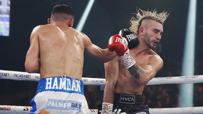 Hassan Hamden lands a punch on Trent Girdham.