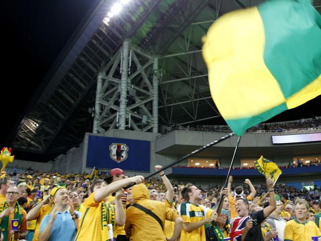 Fans wait for the start of the World Cup Group B qualifying match between Japan and Australia.