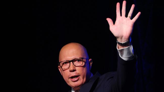 Australia's Opposition Leader Peter Dutton waves after conceding defeat in the general election at the Liberal Party election night event in Brisbane on May 3, 2025. Australia's right-leaning opposition leader Peter Dutton conceded defeat in a general election on May 3, saying he had spoken to Prime Minister Anthony Albanese. (Photo by Patrick Hamilton / AFP)
