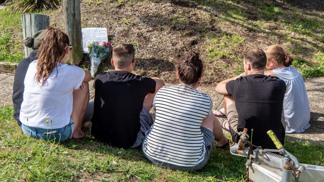 Friends of Liam Anderson assembled at the scene of his death on Sunday afternoon. Picture: Monique Harmer