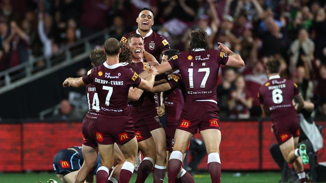 Lindsay Collins of the Maroons celebrates with teammates after Cameron Munster of the Maroons scored against New South Wales Blues at Adelaide Oval on May 31, 2023 in Adelaide, Australia. (Photo by Cameron Spencer/Getty Images)