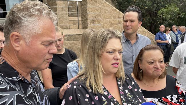 Paul Grapsas' wife Jessica Grapsas, supported on either side by her parents, speaking outside Geelong Law Courts following the sentencing his killer, Bailey Clifford.