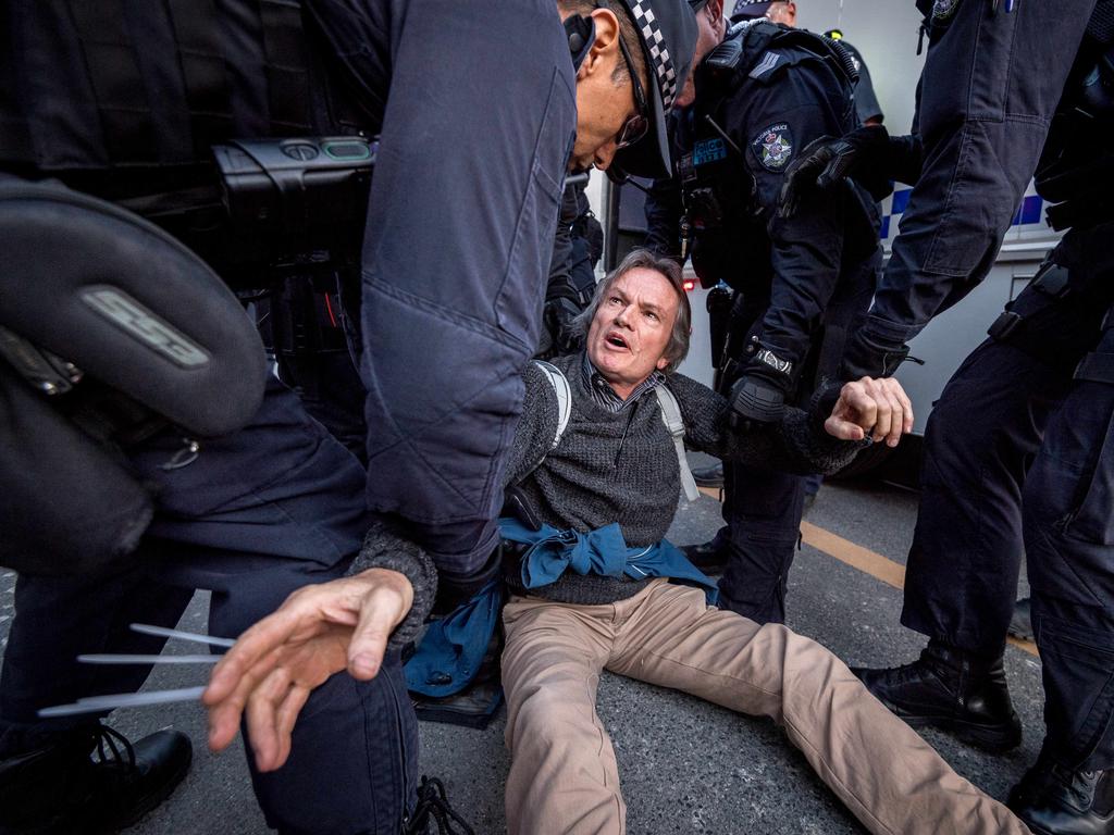 Protesters were arrested after blocking Flinders Street in Melbourne. Picture: Jake Nowakowski
