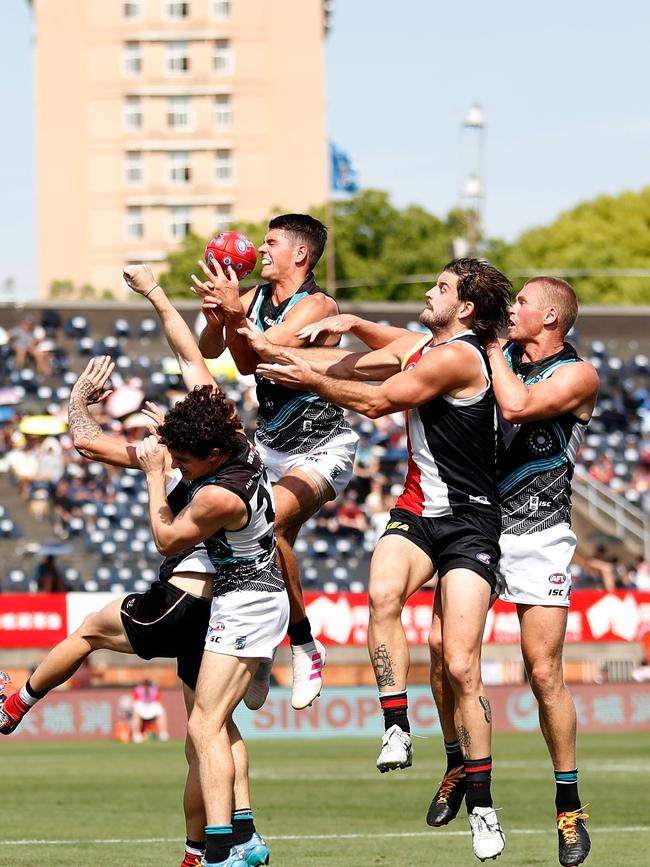 Port Adelaide’s Ryan Burton takes a strong mark opposed to St Kilda’s Josh Bruce at China’s Jiangwan Stadium last year. Picture: MICHAEL WILLSON (AFL Photos).