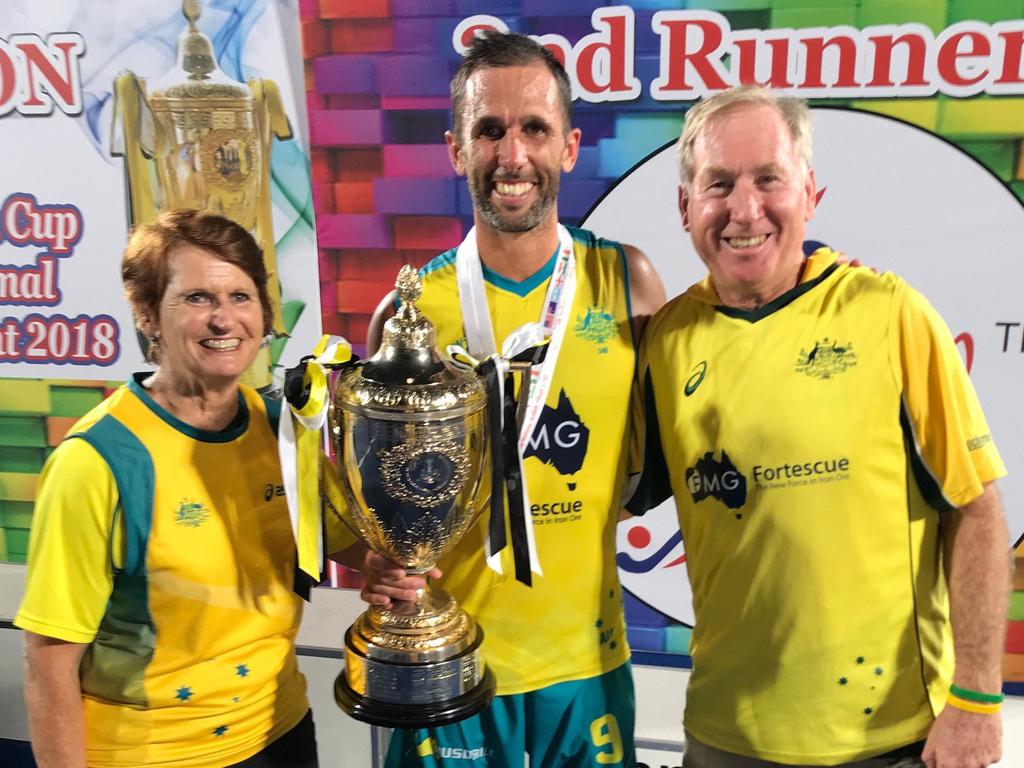 Then Kookaburras’ captain Mark Knowles celebrates the team’s win at the Azlan Shah Cup with parents Barb and Ryan Knowles.