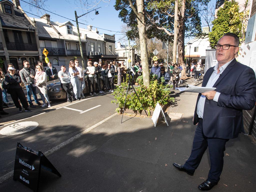 John McGrath oversees an auction in Sydney’s Surry Hills. Picture: Julian Andrews