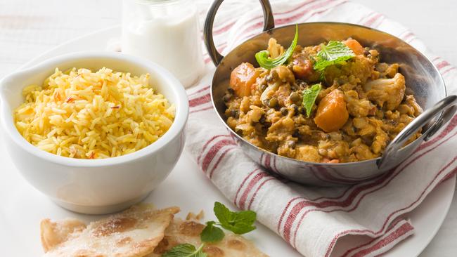 Going vegan doesn’t mean a life without flavour. Try this coconut lentil dhal with saffron pilaf rice. Picture: Supplied