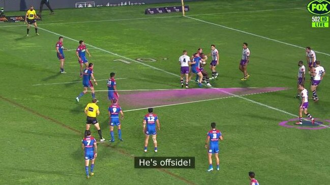 Cameron Smith talks to referee Ben Cummins during Melbourne's win over Newcastle.