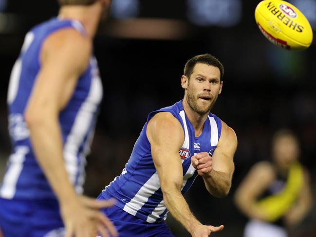 Sam Gibson fires out a handball for North Melbourne in 2017. Will he play for Sorrento in the MPNFL Division 1 grand final? Picture: Michael Klein