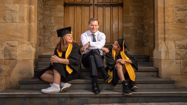 University of Adelaide Vice-Chancellor and President Professor Peter Rathjen AO, with Children's University Australia students Molly 11 and Miller 9. Picture: Brad Fleet