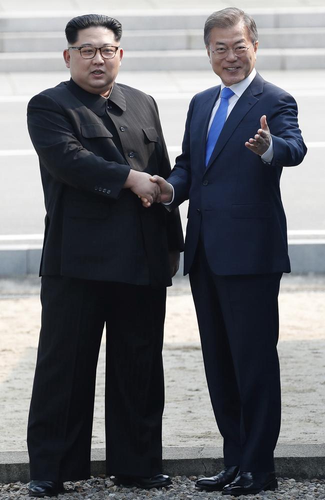 North Korean leader Kim Jong Un, left, shakes hands with South Korean President Moon Jae-in at the border village of Panmunjom in the Demilitarized Zone. Picture: AP