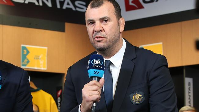 BRISBANE, AUSTRALIA - MAY 30: Wallabies coach Michael Cheika (right) announces players with Greg Clark from Fox Sports, during the Australia Wallabies squad announcement at Suncorp Stadium on May 30, 2018 in Brisbane, Australia. (Photo by Jono Searle/Getty Images)