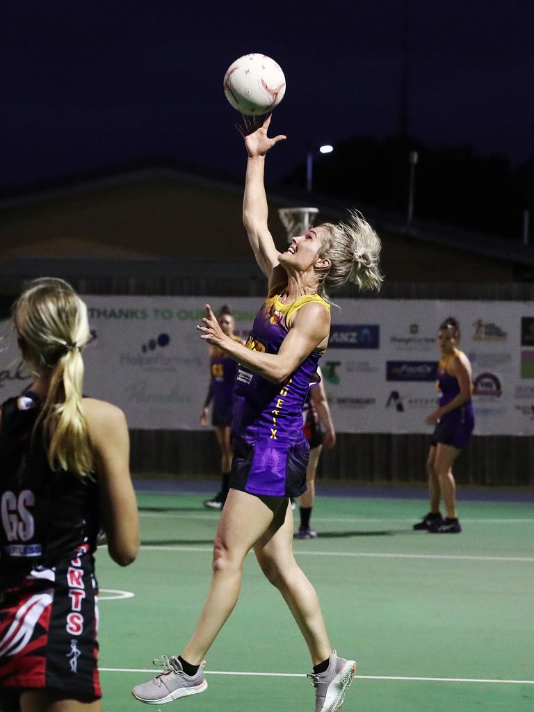 Fierce's Jamie Broadley reaches out in the Cairns Netball Association Senior Division 1 match between the Phoenix Fierce and the Cairns Saints. PICTURE: BRENDAN RADKE