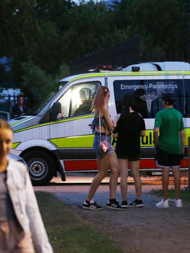 An ambulance leaves the scene of a workplace accident, where a woman fell from an amusement ride at the Cairns Showgrounds, suffering critical injuries. Picture: Brendan Radke