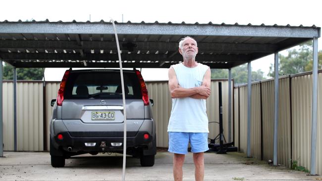 A big power line landed over the car port of resident Russ Gazitepe. Picture: Richard Dobson