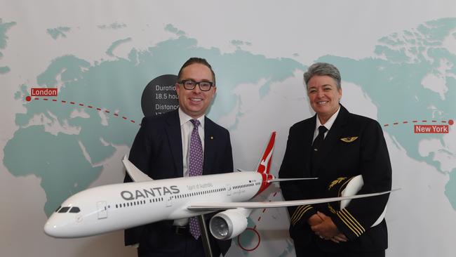 QANTAS Group CEO Alan Joyce joins Fleet Manager B787-9, Captain Lisa Norman in front of the Project Sunrise amp following the QANTAS Group full year results announcement in Sydney, Thursday, August, 22, 2019. (AAP Image/Dean Lewins) NO ARCHIVING