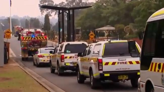 Fire trucks in the funeral procession of firefighter Geoffrey Keaton at Pine Grove Memorial and Crematorium Picture: 7News