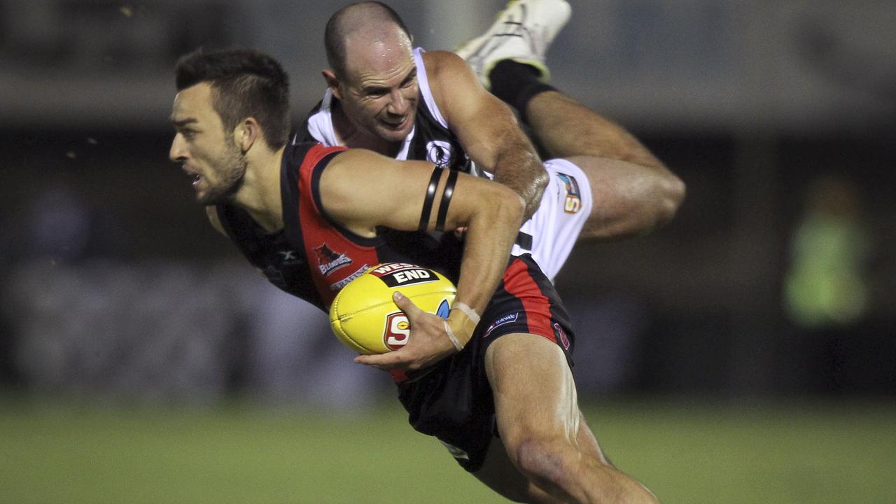 SANFL: West Adelaide v Port Adelaide at Richmond Oval. Port's Matthew Broadbent tackles Wests Brett Turner.29 March 2019. Picture Dean Martin