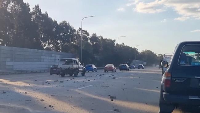 Debris on the M1 in Oxenford after a truck shed its load.
