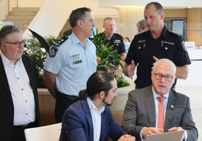 Sunshine Coast Council Mayor Mark Jamieson is shown how the bushfire detection system works by exci's Julian Thaller. Picture: Supplied