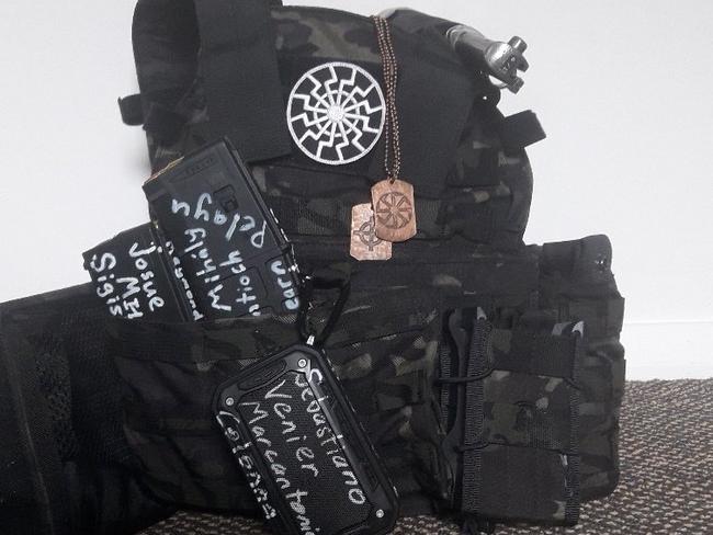 Mosque shooter Brenton Tarrant had covered his bullet-proof vest, webbing, guns and ammunition holders with white supremacist symbology, phrases and names. Picture: Twitter