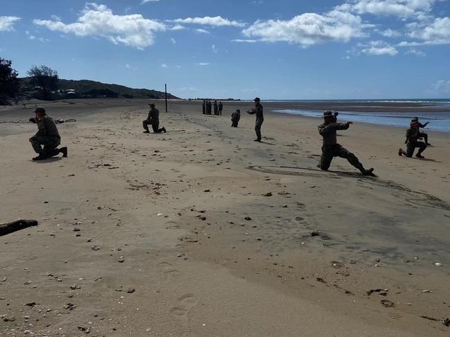 US Coast Guard Port Security Unit 312 (PSU 312) shoreside security division team conducts formation sweeps on Kings Beach near Bowen, Australia on July 13, 2023 as part of a Joint Logistics Over the Shore (JLOTS) operation – the first time this had ever been done during Exercise Talisman Sabre. Picture: Petty Officer 1st Class Chris Johnson/US Coast Guard