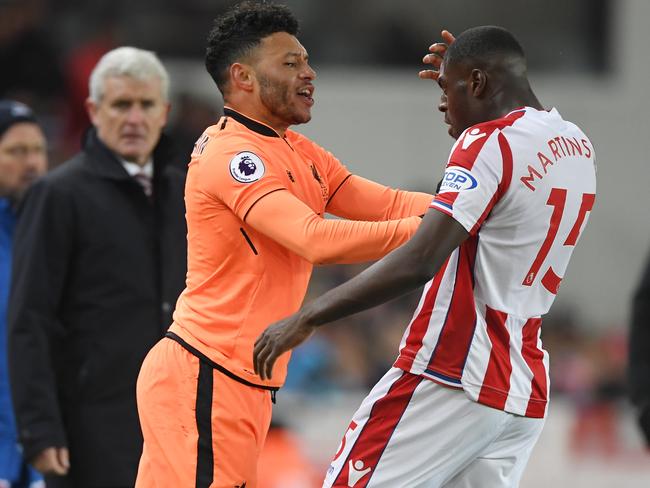 Alex Oxlade-Chamberlain and Bruno Martins Indi clash. (Photo by Stu Forster/Getty Images)