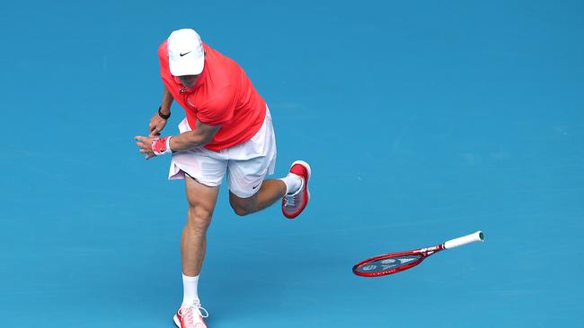 Denis Shapovalov smashes his racquet. Picture: Cameron Spencer/Getty