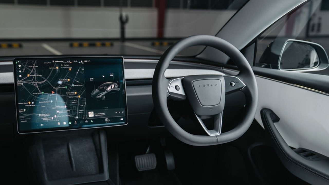 Tesla has made the steering wheel even more minimal by removing the indicator and gear selector stalks.