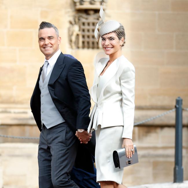 Robbie Williams with his wife Ayda Field at the wedding of Princess Eugenie. (Photo by Alastair Grant / various sources / AFP)